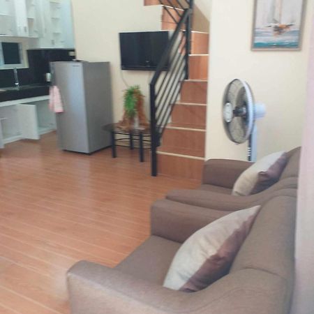 Estilo Apartment 2-Storey Clarin  Экстерьер фото