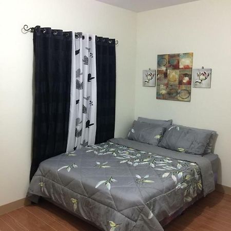 Estilo Apartment 2-Storey Clarin  Экстерьер фото