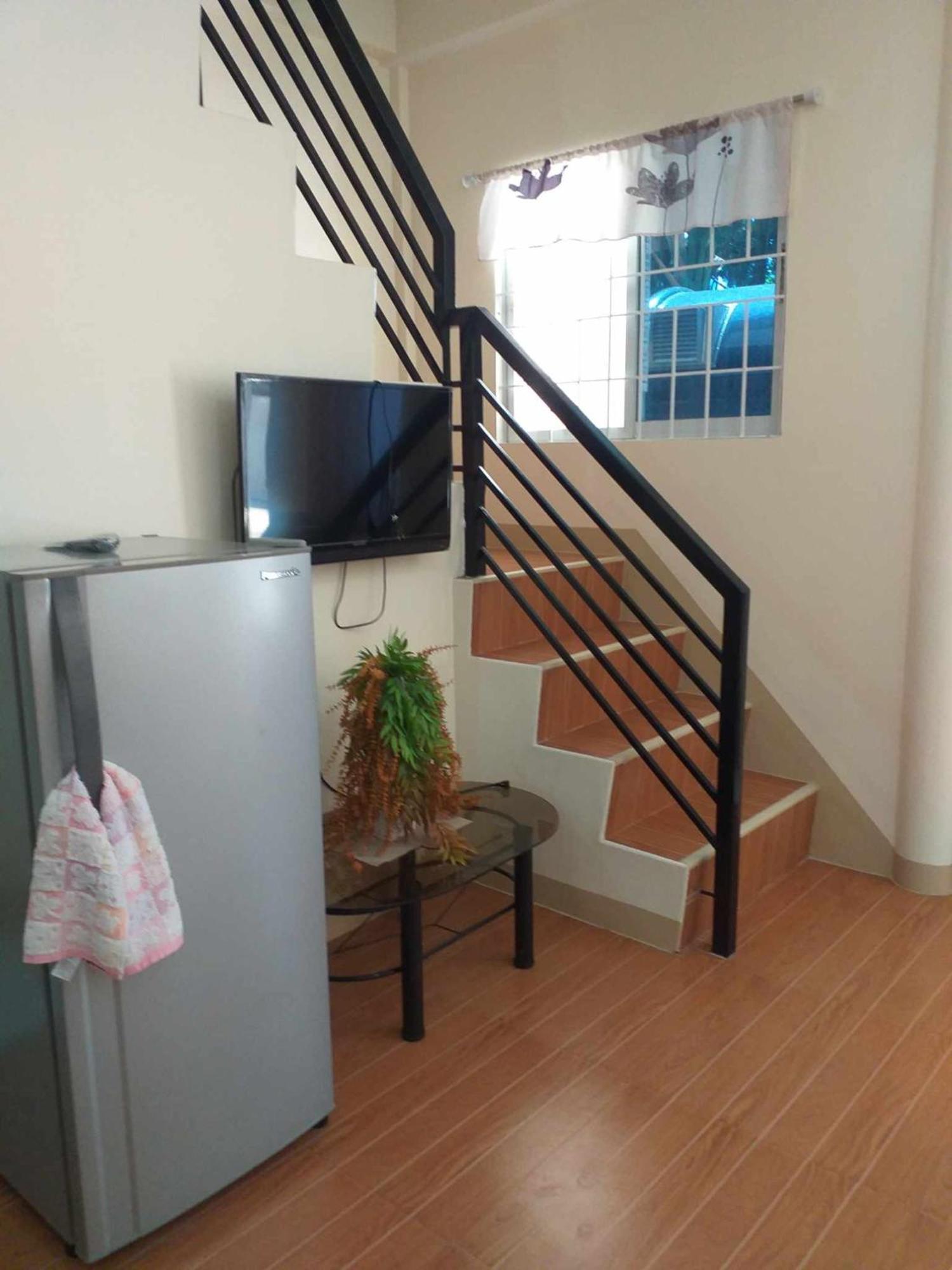 Estilo Apartment 2-Storey Clarin  Экстерьер фото