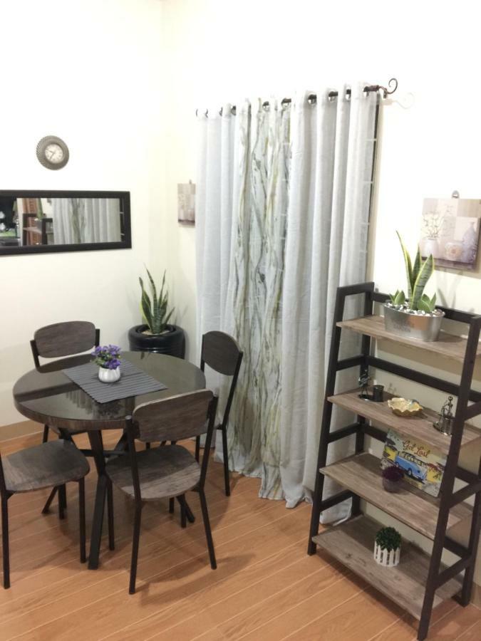 Estilo Apartment 2-Storey Clarin  Экстерьер фото