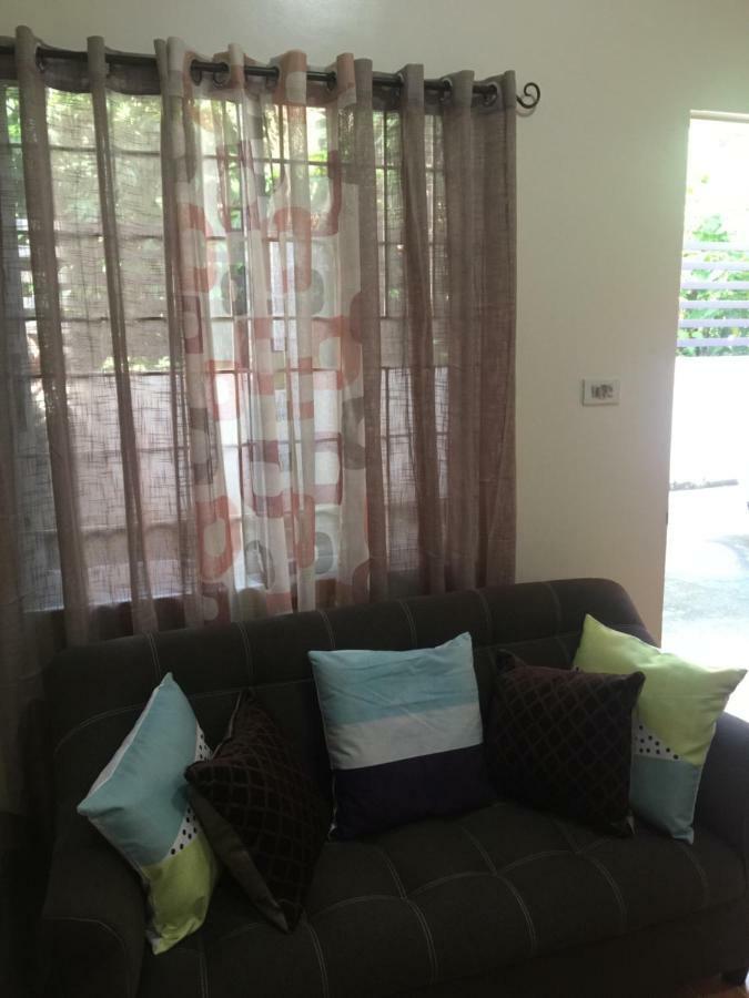 Estilo Apartment 2-Storey Clarin  Экстерьер фото